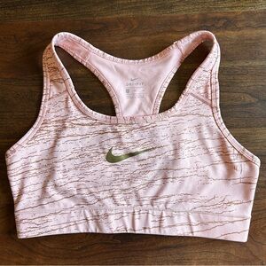 Nike Women's Light Pink Sports Bra with Gold Accents